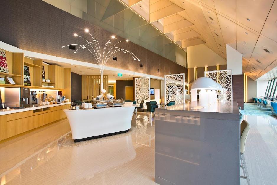 Отель Ambassador Transit Lounge Terminal 2 Сингапур Экстерьер фото